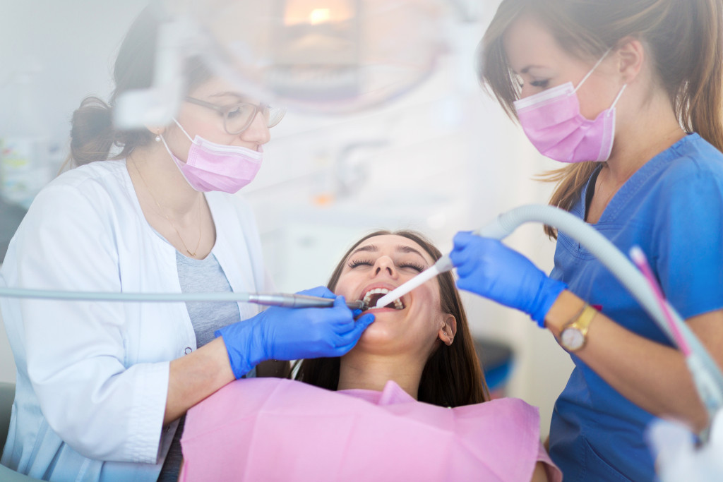 dental practitioner providing oral care service