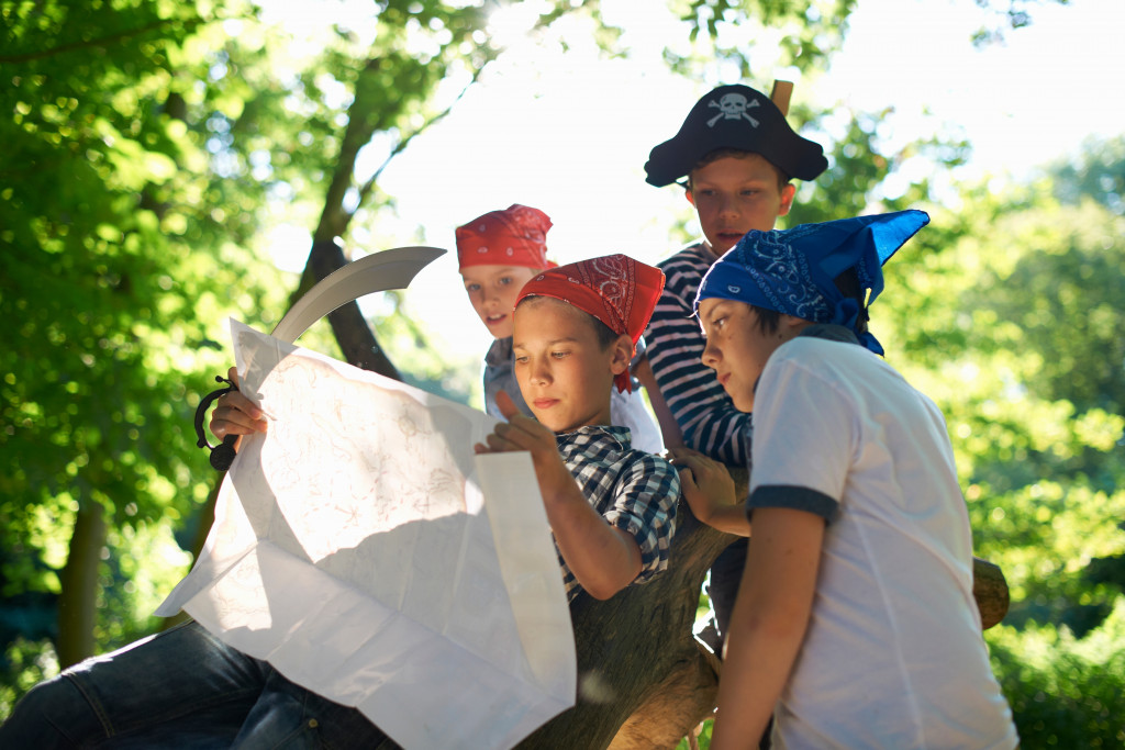 A group of boys playing scavenger hunt