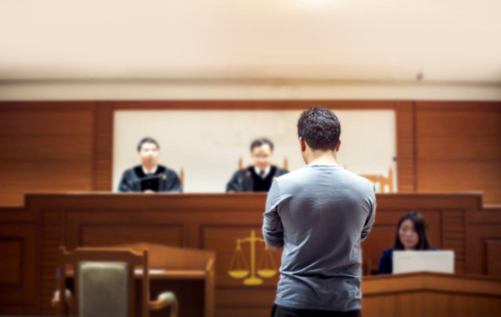 Man stands before court