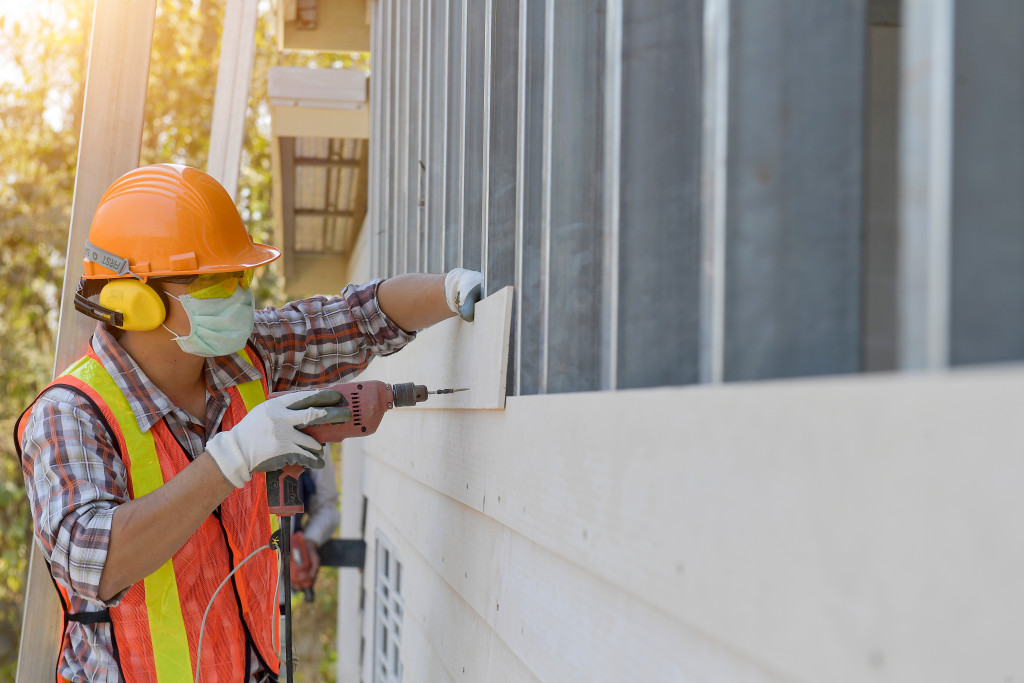 Construction worker improving home with a construction project