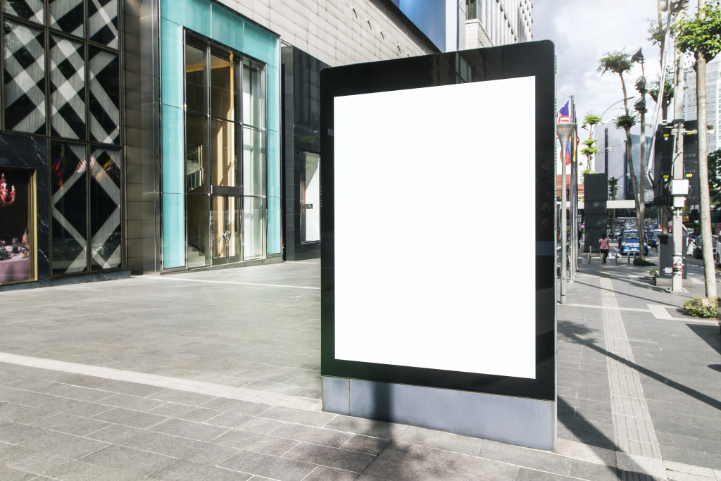 blank advertising banner on city street