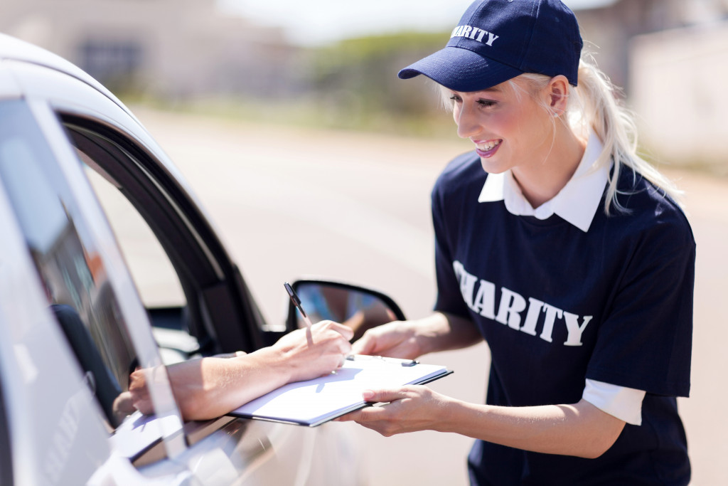 a volunteer at a charity fundraising