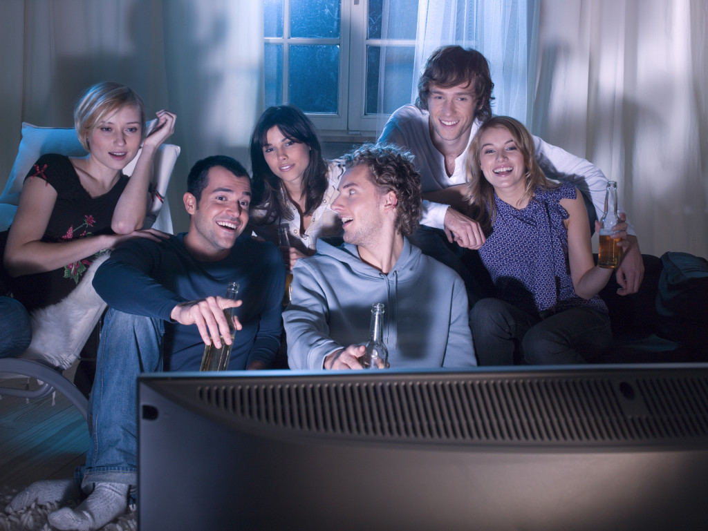 a group of people enjoying watching a movie