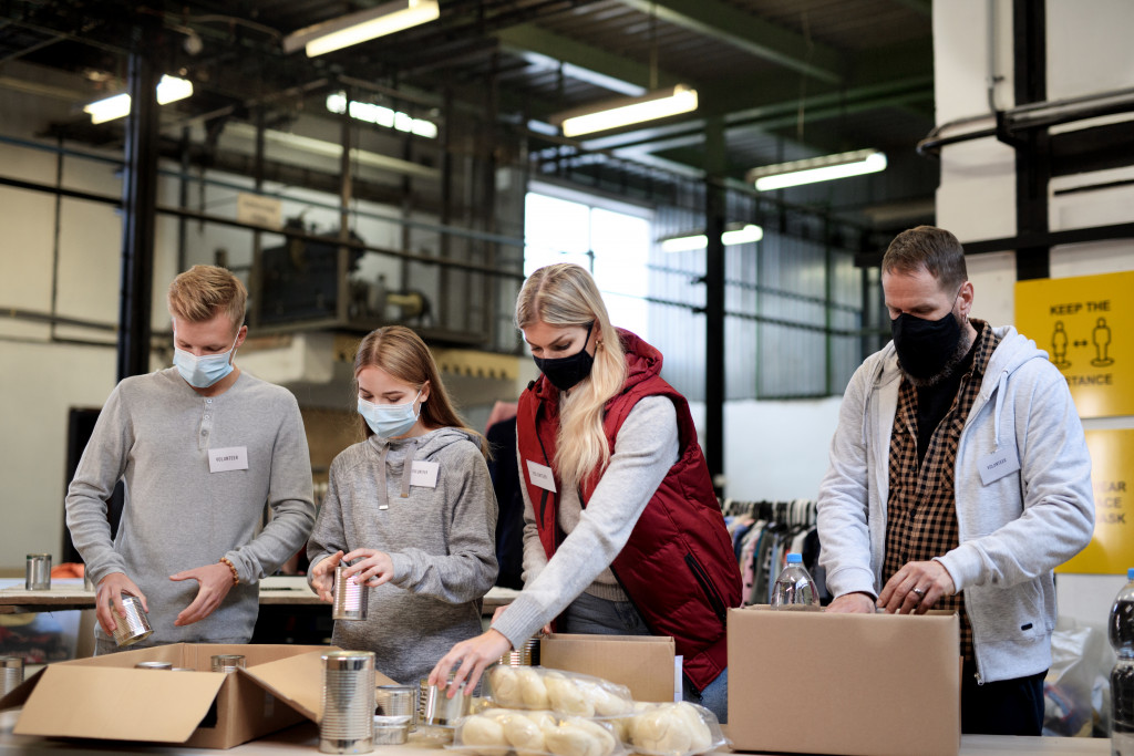 Volunteers helping distribute food at a community food bank.