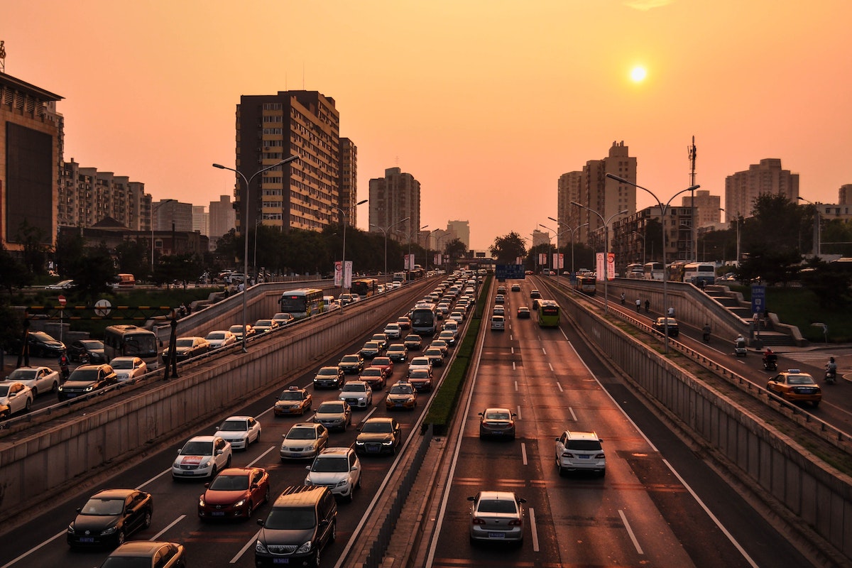 Vehicle in Road at Golden Hour