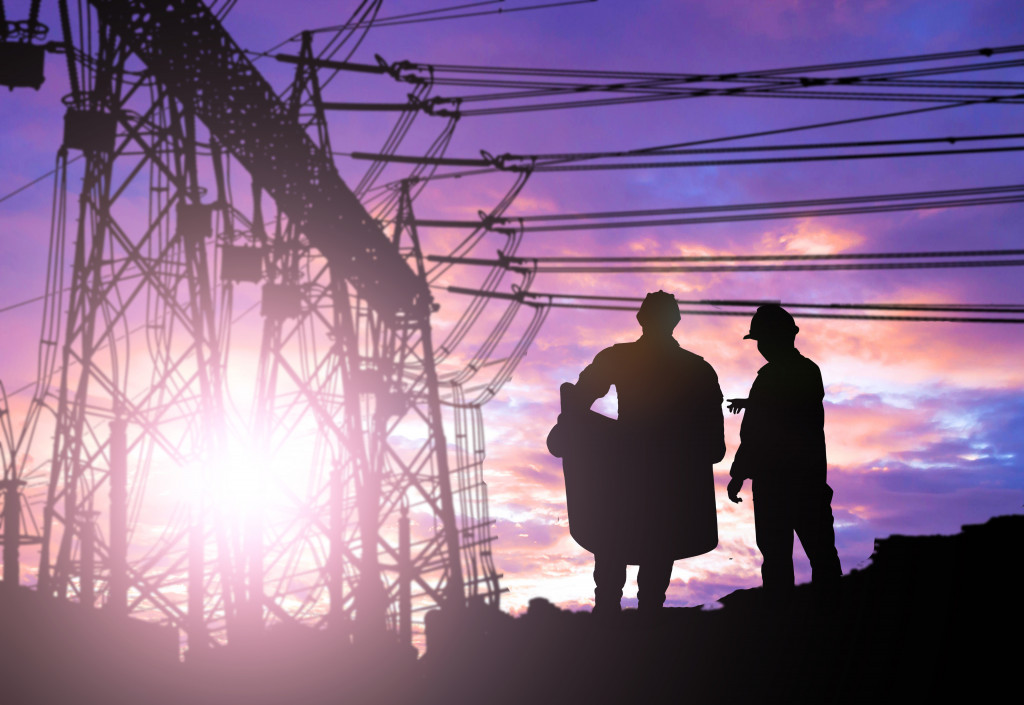 electrical business experts in a silhouette