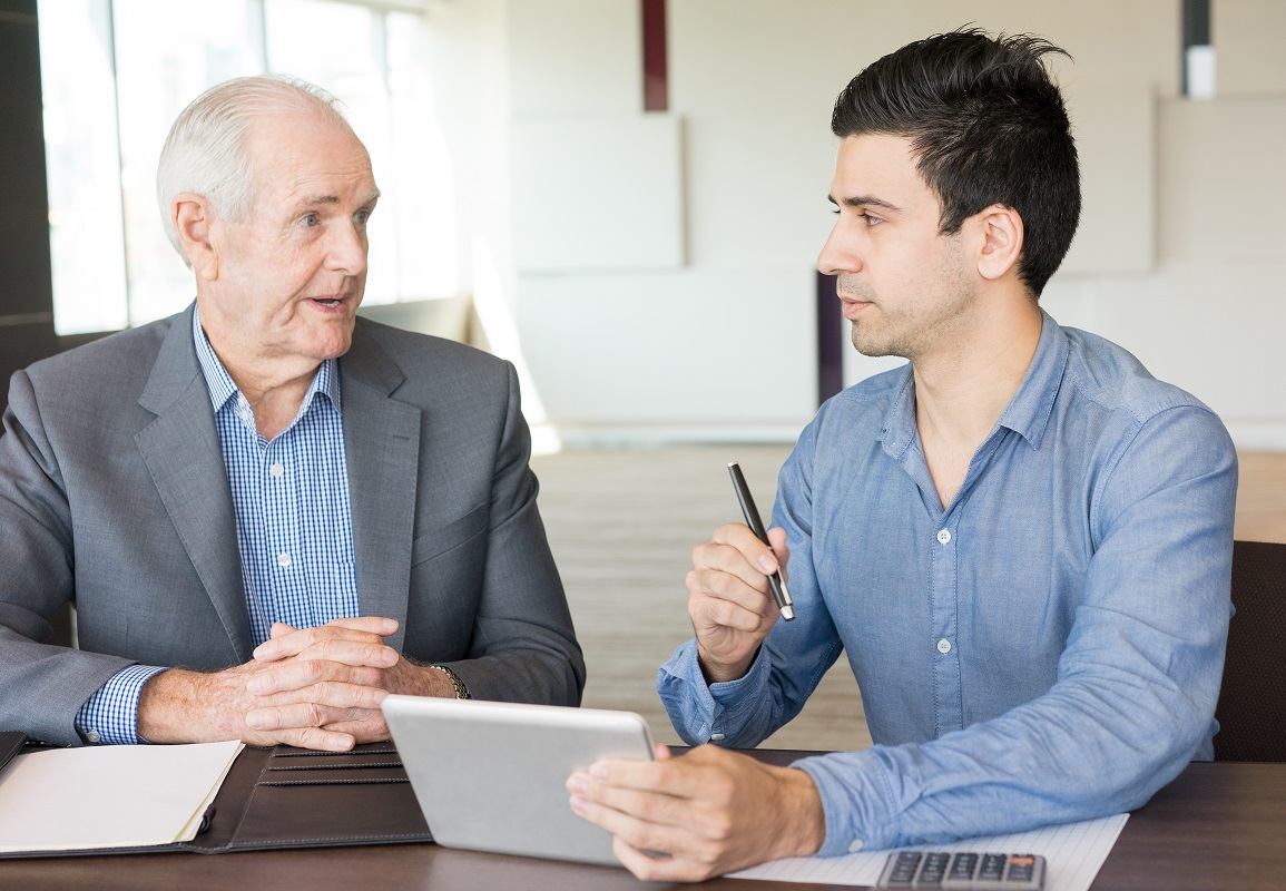 young man listening to the old man talking