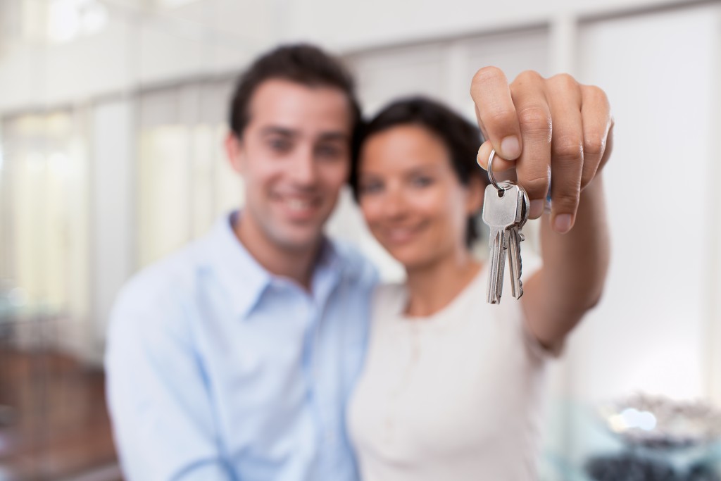 couple holding keys