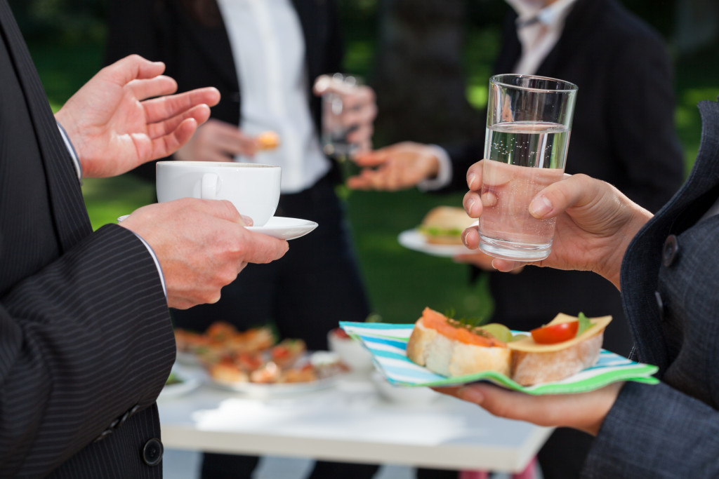 business people having lunch buffet