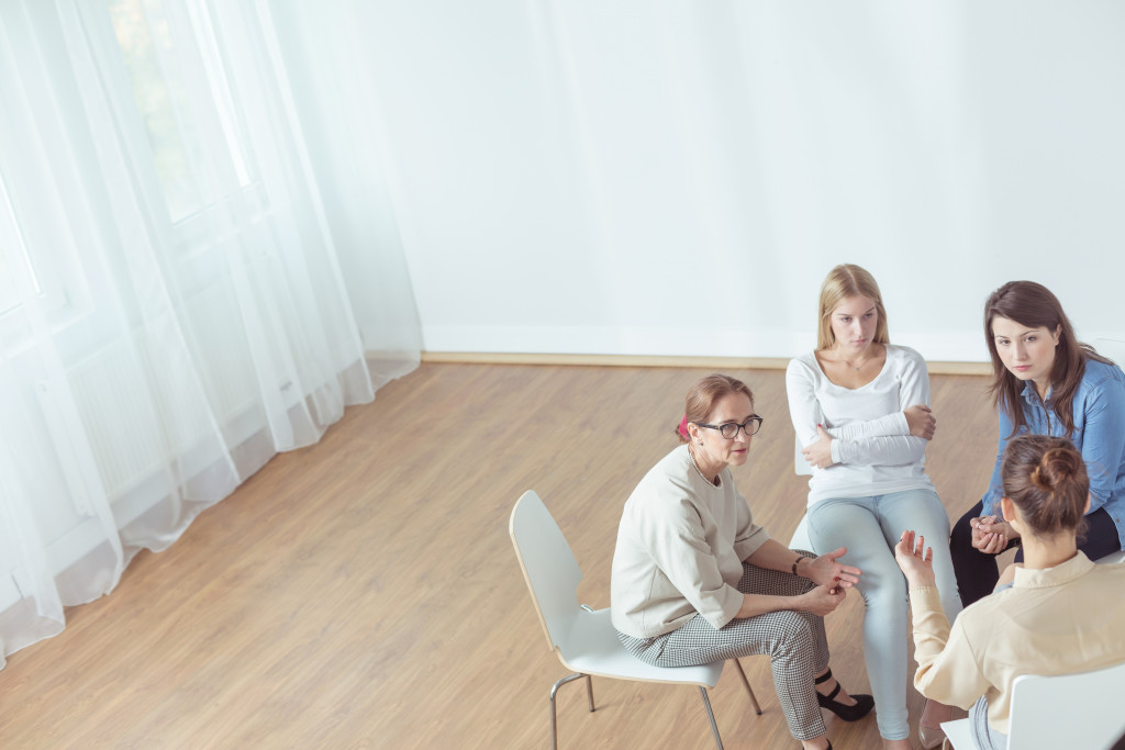 support group for women talking together